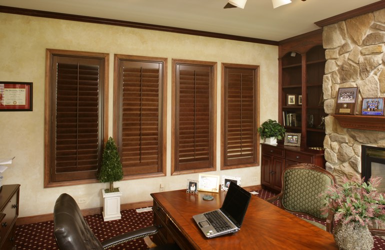 Wooden plantation shutters in a Dallas home office